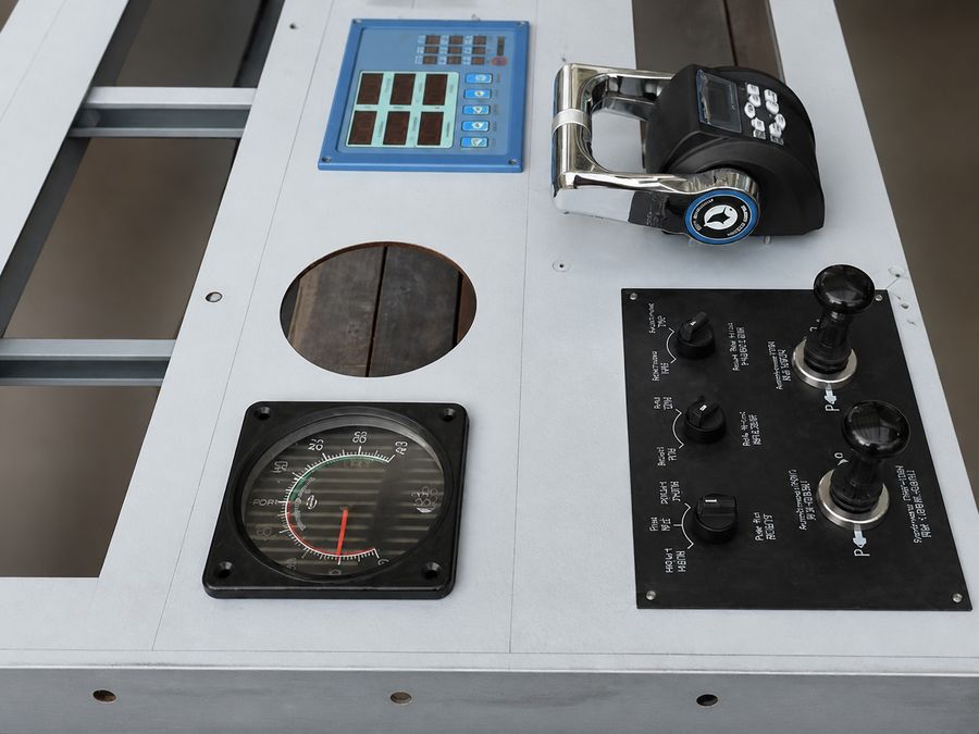 Rudder angle indicator being fitted on a bridge console